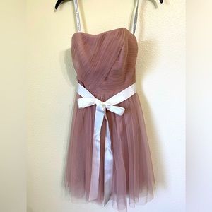 Soft pink tool dress. With a white ribbon on waist. Strapless short dress. Sz 4